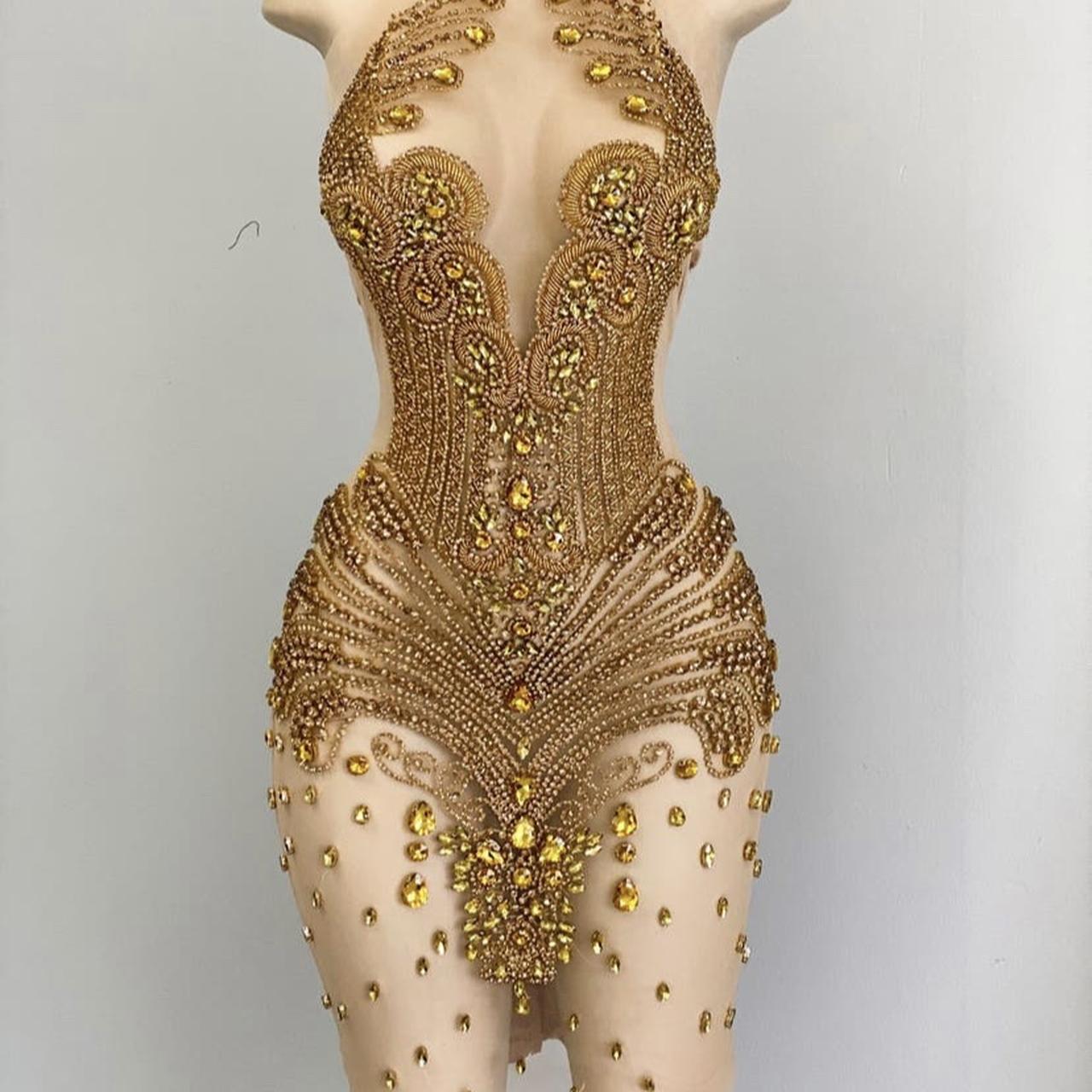 Hermoso vestido de fiesta sexy sin mangas con encaje de sirena dorado largo