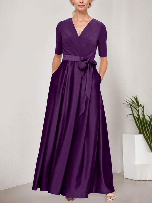 Vestido de gala con escote cruzado, falda de satén y corpiño de jersey