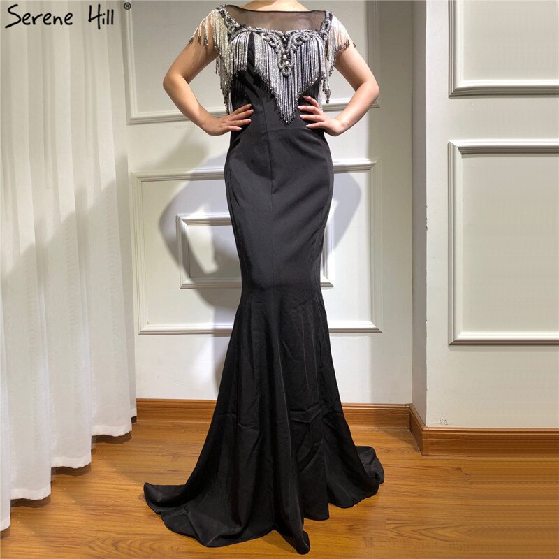 Im Angebot keine Rückgabe keine Rückerstattung Verkauf Schwarze ärmellose Meerjungfrau Abendkleider 2025 Perlen Quaste Sexy elegantes Abendkleid LA70078 