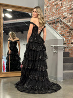 Vestido de fiesta estilo princesa con hombros descubiertos, corsé y volantes de encaje