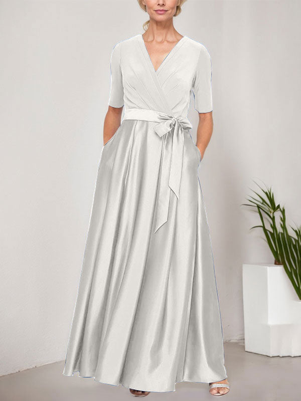 Vestido de gala con escote cruzado, falda de satén y corpiño de jersey
