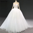 Vestidos de novia sexys con lentejuelas y cuentas color marfil, mangas largas y brillantes, cuello redondo, HA2332, hechos a medida 