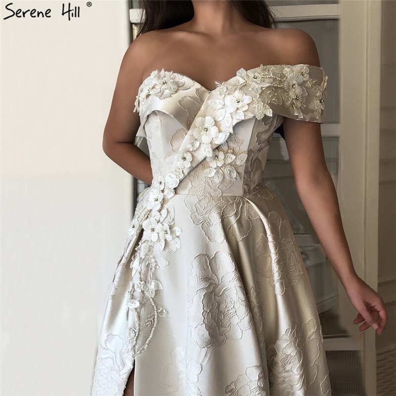 Im Angebot Keine Rückgabe Keine Rückerstattung Verkauf Elfenbein One Shoulder Sexy Abendkleider Lang 2025 Dubai Handgemachte Blumen Diamanten Abendkleid LA60947 