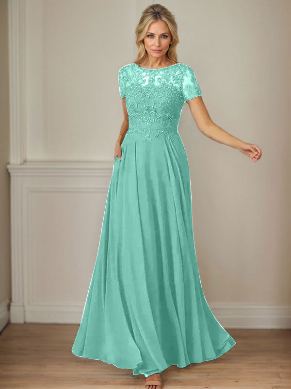 Vestido de gasa azul marino oscuro con escote barco, lentejuelas y corte en A