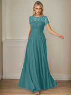 Vestido de gasa azul marino oscuro con escote barco, lentejuelas y corte en A
