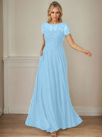 Vestido de gasa azul marino oscuro con escote barco, lentejuelas y corte en A