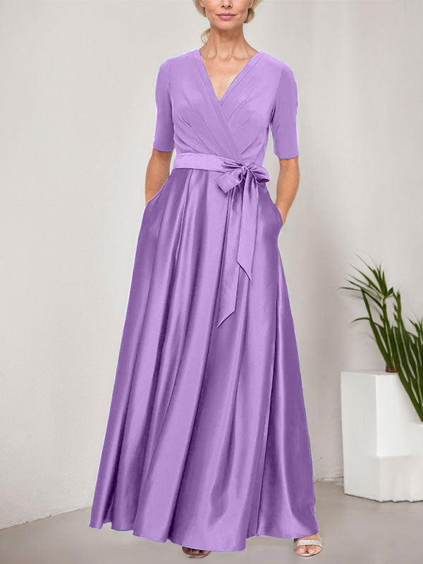 Vestido de gala con escote cruzado, falda de satén y corpiño de jersey
