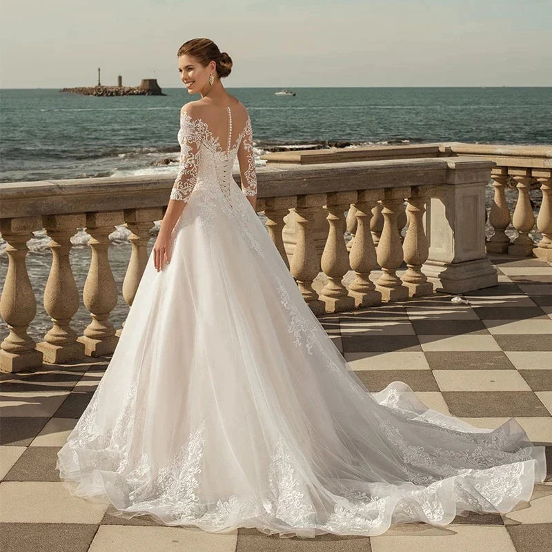 MACDUGAL Exquisite Three-Quarter Sleeves Mopping O-Neck Lace Charming Applique Back Lace Double Button Wedding Dress-payinti
