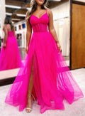 Galilea | Vestido de fiesta largo fucsia con escote en V, corpiño transparente y abertura.