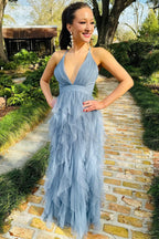 Vestido largo con escote en V y volantes cruzados en azul ahumado