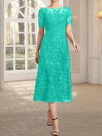 Vestido de madre de la novia de encaje con lentejuelas, corte A, escote ilusión y largo hasta la rodilla