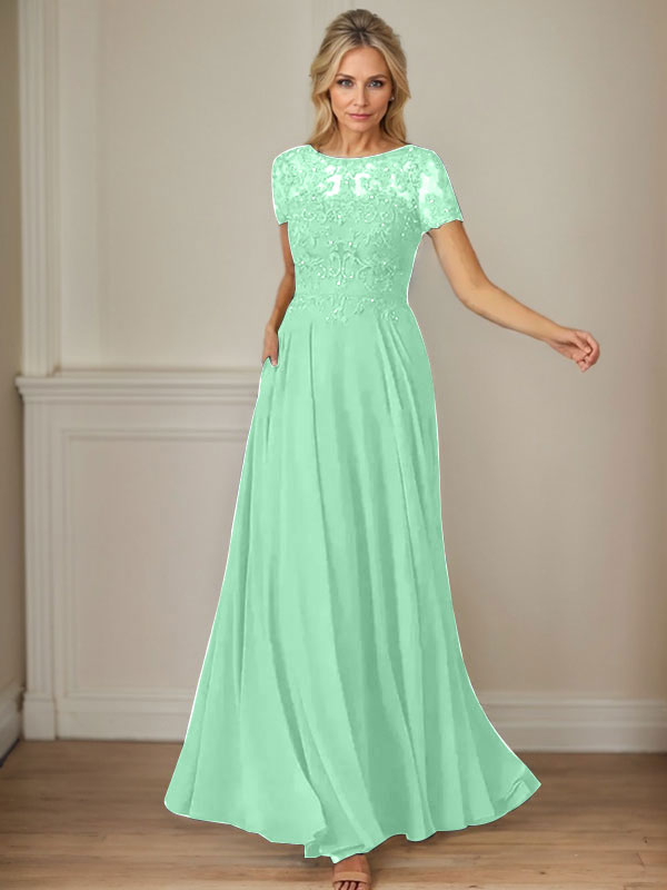 Vestido de gasa azul marino oscuro con escote barco, lentejuelas y corte en A
