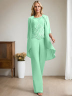 Vestido de madre de la novia de gasa con encaje, escote redondo y lentejuelas y mono/pantalón separado