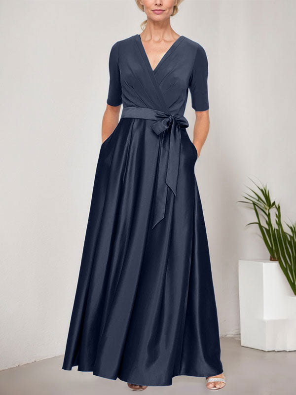 Vestido de gala con escote cruzado, falda de satén y corpiño de jersey