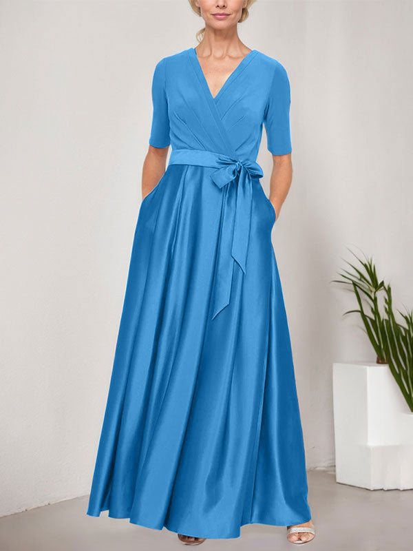 Vestido de gala con escote cruzado, falda de satén y corpiño de jersey