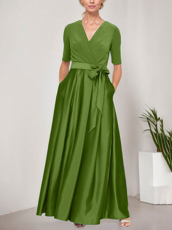 Vestido de gala con escote cruzado, falda de satén y corpiño de jersey
