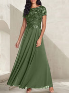 Vestido largo de madre de la novia con escote redondo, corte A, color gris carbón y cuentas