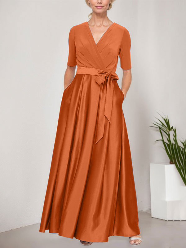 Vestido de gala con escote cruzado, falda de satén y corpiño de jersey