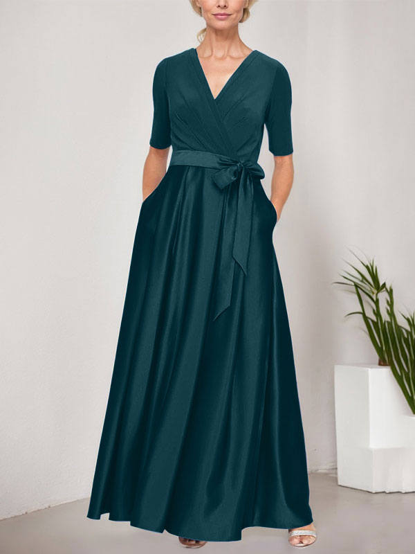 Vestido de gala con escote cruzado, falda de satén y corpiño de jersey