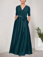 Vestido de gala con escote cruzado, falda de satén y corpiño de jersey