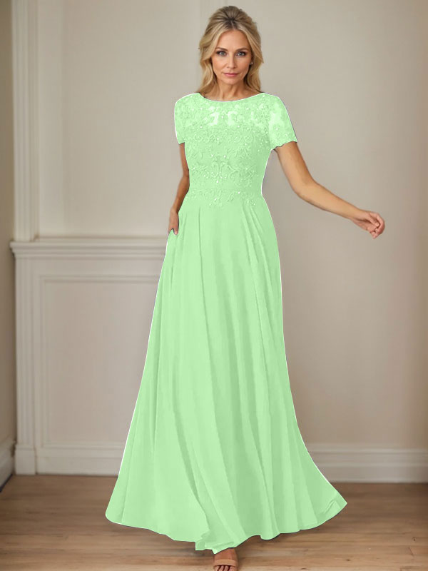 Vestido de gasa azul marino oscuro con escote barco, lentejuelas y corte en A