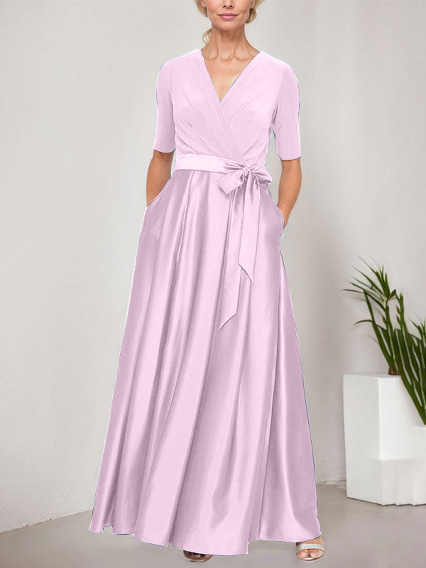 Vestido de gala con escote cruzado, falda de satén y corpiño de jersey