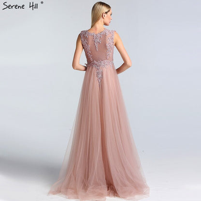 Vestido de noche sexy de tul rosa con escote redondo, perlas y cristales, corte A, sin mangas, 2025 LA60981 