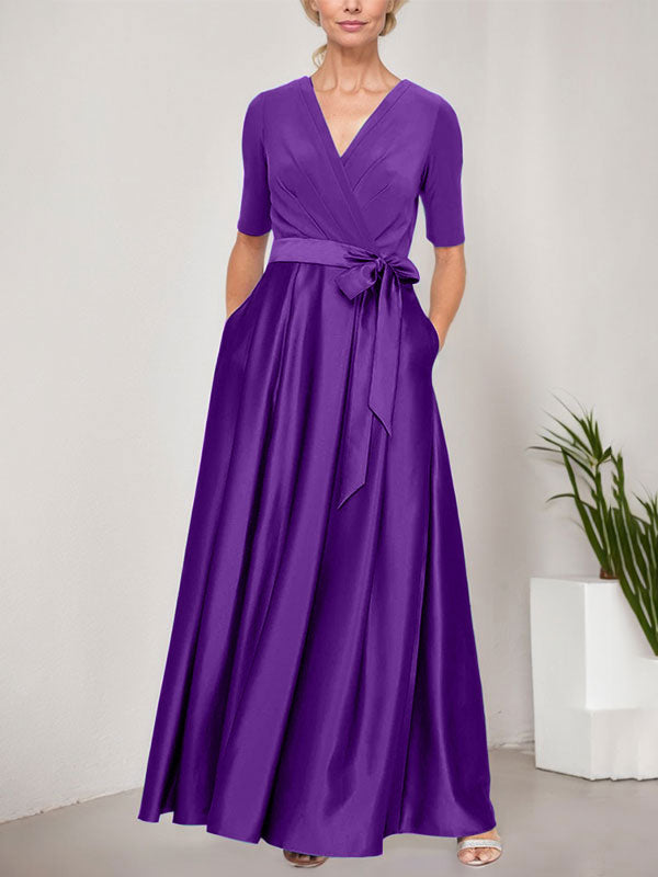 Vestido de gala con escote cruzado, falda de satén y corpiño de jersey