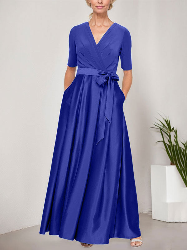 Vestido de gala con escote cruzado, falda de satén y corpiño de jersey