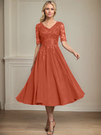 Vestido de gasa con encaje y lentejuelas para madre de la novia, corte A, escote en V y largo hasta la rodilla