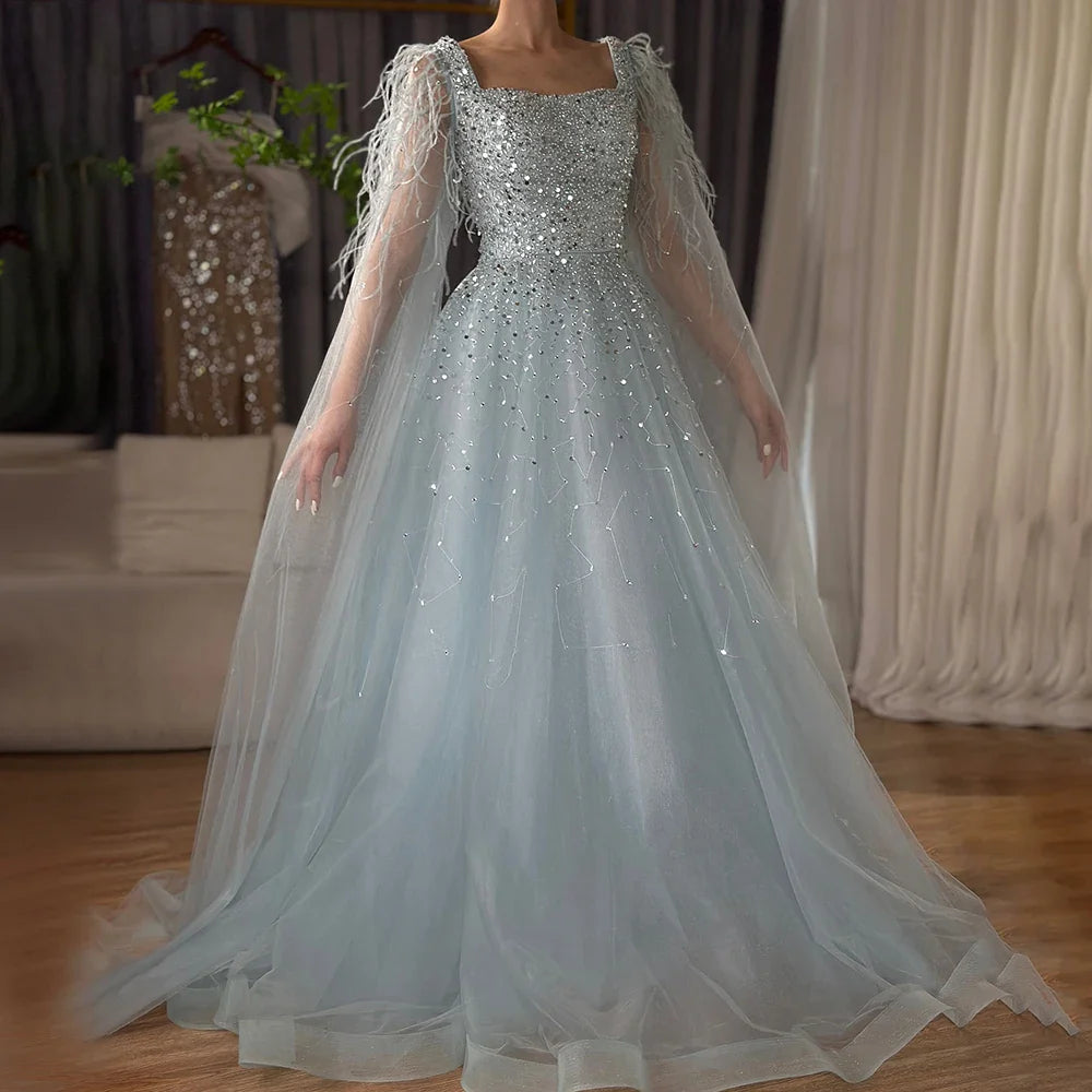 Vestidos de noche saudíes de lujo, corte A, azul árabe, con plumas, mangas capa y cuentas, para ocasiones formales 2025 LA71782A 