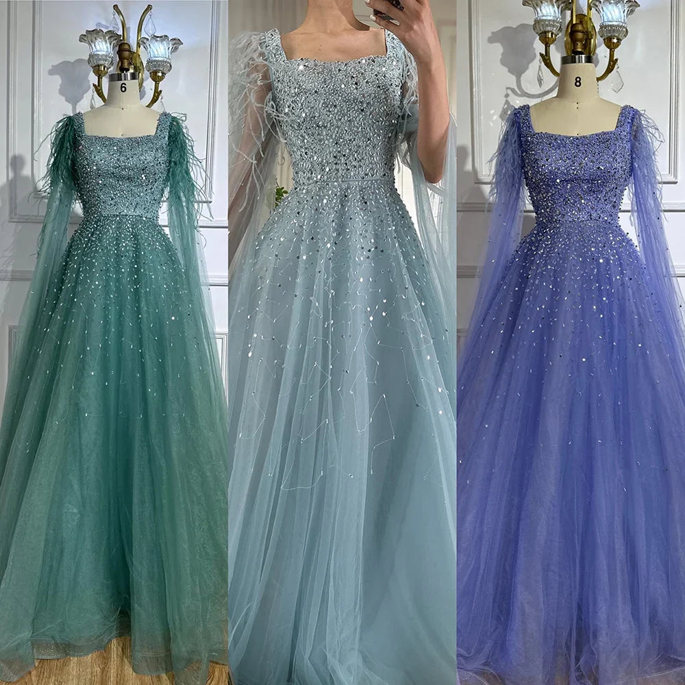 Vestidos de noche saudíes de lujo, corte A, azul árabe, con plumas, mangas capa y cuentas, para ocasiones formales 2025 LA71782A 