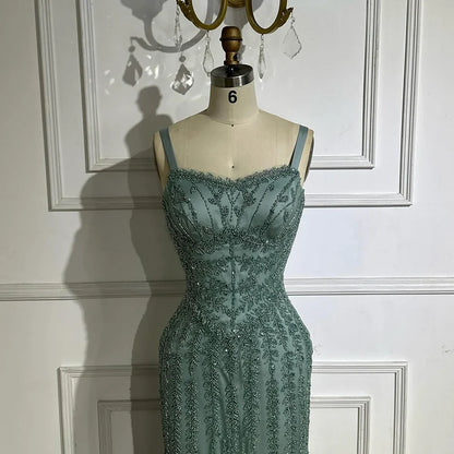 2025 Arabic Blue Spaghetti Strap Mermaid Gown Luxury Beaded Saudi Evening Dress for Formal Occasion LA72725