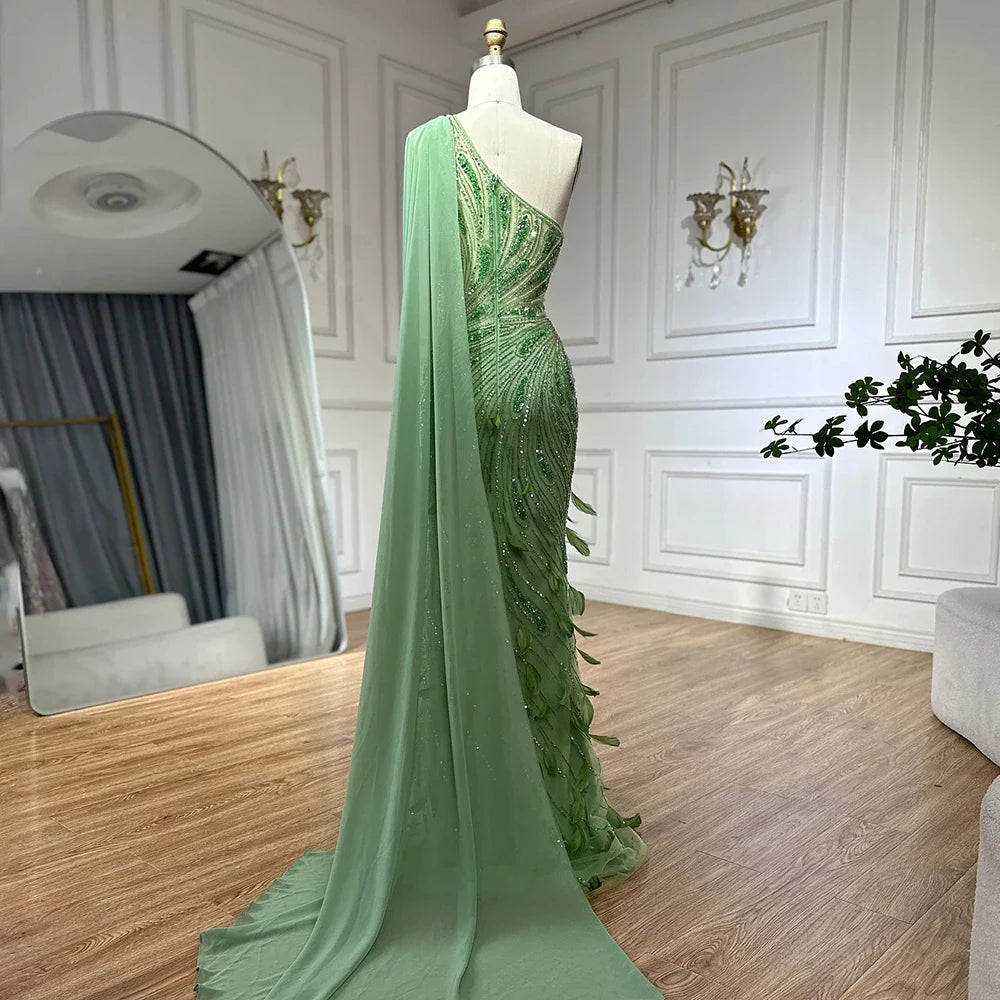 2025 Arabic Green One Shoulder Beaded Feathers Luxury Evening Gowns with Side Cape Shawl for Women's Party LA72698