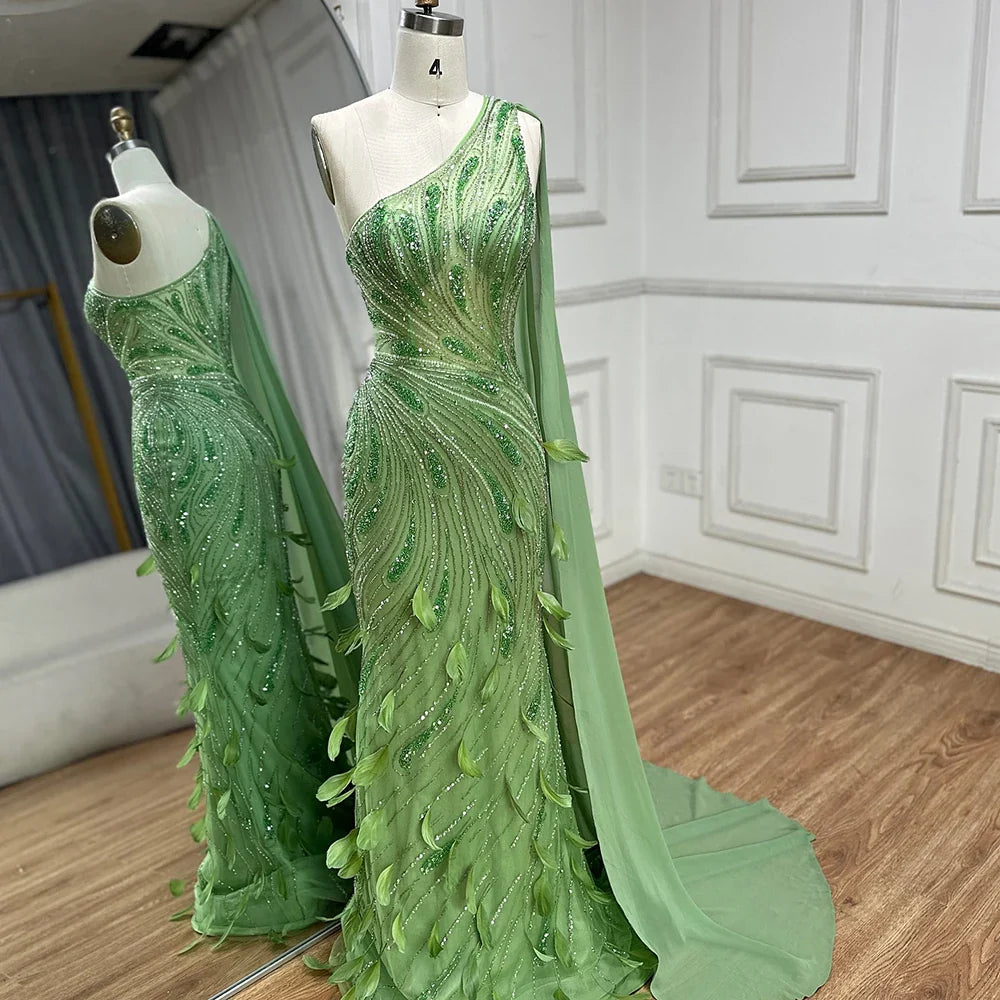 2025 Arabic Green One Shoulder Beaded Feathers Luxury Evening Gowns with Side Cape Shawl for Women's Party LA72698