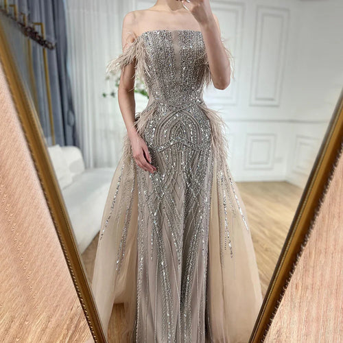 Vestido de noche azul sirena saudí de lujo con plumas y cuentas, con falda superpuesta para ocasiones formales (2025) LA72727 