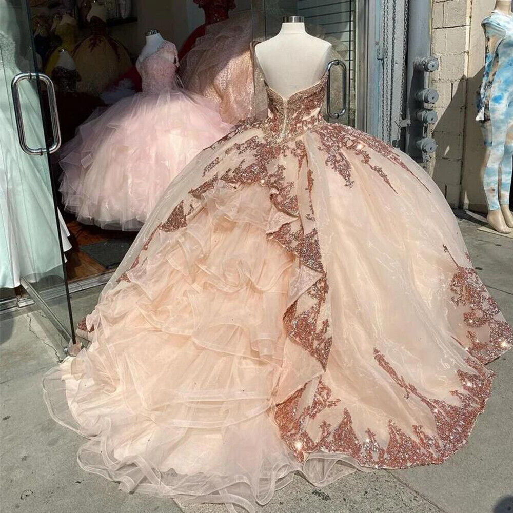 Vestidos de quinceañera en oro rosa con apliques de lentejuelas y escote corazón Y401