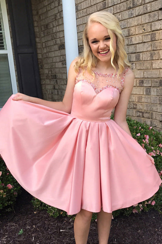 Ärmelloses, rückenfreies, kurzes Ballkleid mit Perlen 