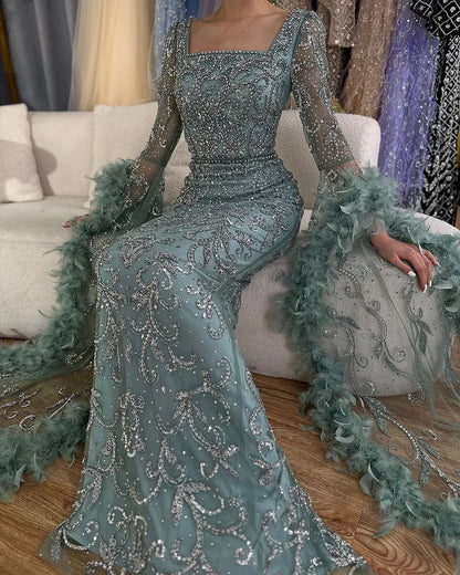 Vestidos de noche de lujo con mangas acampanadas, corte sirena, turquesa, con cuentas y plumas, para ocasiones formales 2025 LA72767 