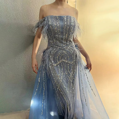 2025 Blue Mermaid Gown Luxury Feathers Beaded Saudi Evening Dress with Overlay Skirt for Formal Occasion LA72727