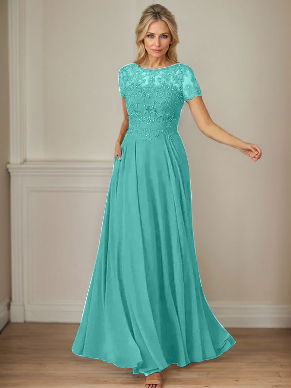 Vestido de gasa azul marino oscuro con escote barco, lentejuelas y corte en A