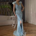 2025 Arabisch Blau Elegante Split Meerjungfrau Perlen Federn Lange Abendkleider Kleider für Formelle Anlässe LA72742 