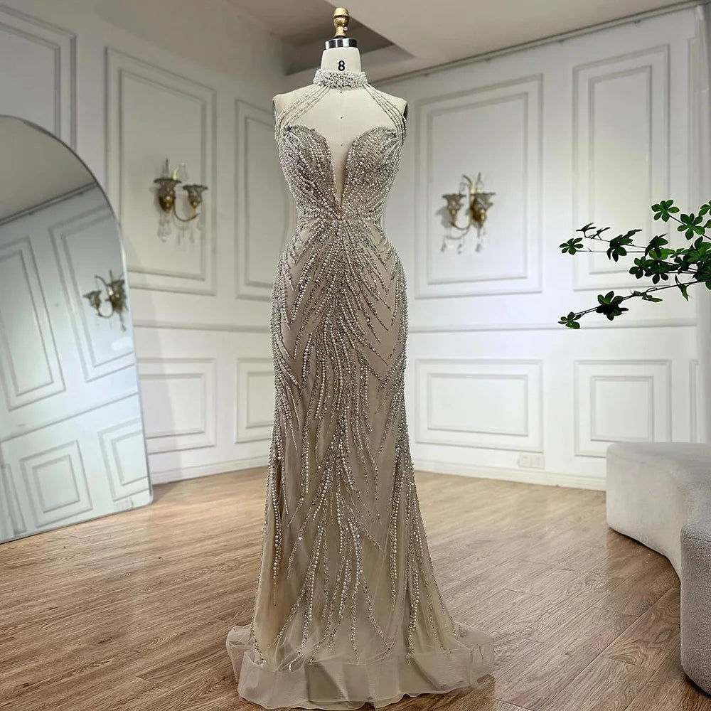 2025 Arabic Nude Halter Neck Mermaid Pearls Beaded Luxury Dubai Evening Gown for Women's Party LA72696