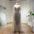 Vestidos de fiesta de boda de sirena color nude blanco 2025 con plumas y cuentas, de lujo, con mangas estilo capa, LA72047A 
