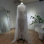 Vestidos de fiesta de boda de sirena color nude blanco 2025 con plumas y cuentas, de lujo, con mangas estilo capa, LA72047A 