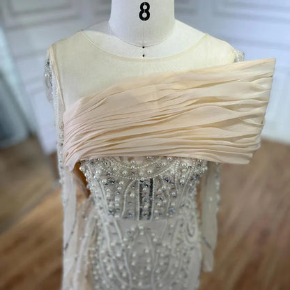 Vestido de noche de sirena con cristales color piel y sobrefalda de manga larga LA72348