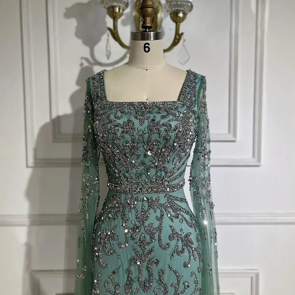 Luxuriöses arabisches türkisfarbenes Abendkleid mit Cape-Ärmeln LA72400