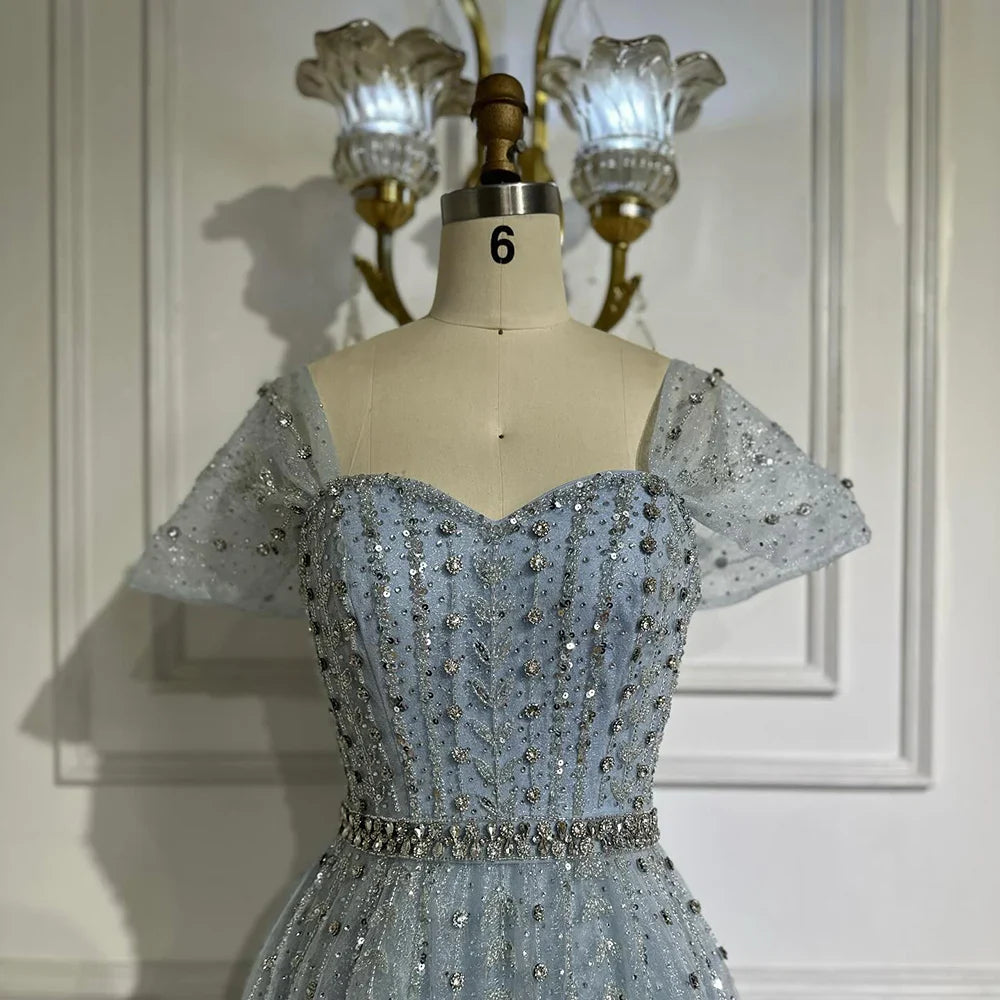 Vestido de noche azul corte A con cuentas y espalda descubierta LA72834