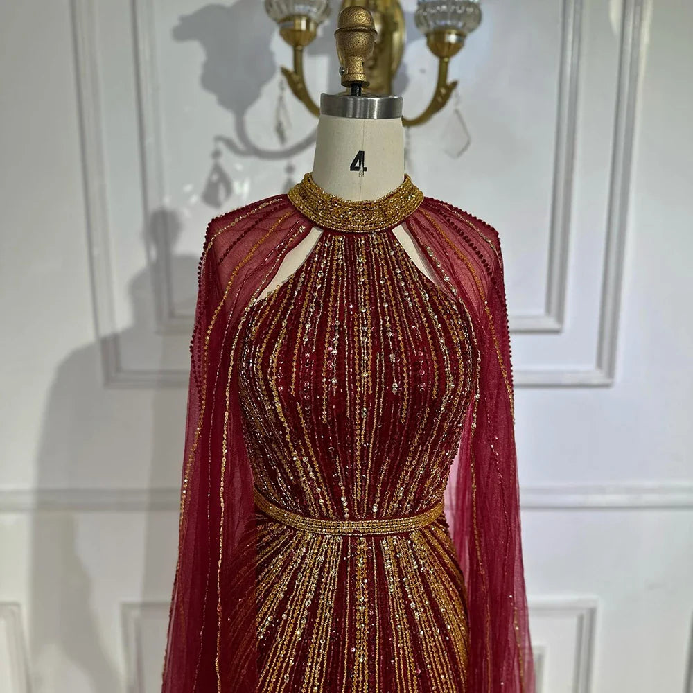 2025 Wine Red Beaded Mermaid Saudi Evening Dress with Cape for Formal Occasion LA72707A