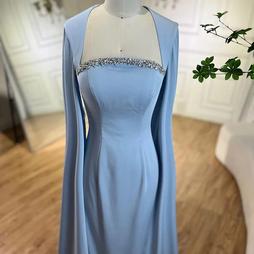 Elegante vestido de noche de sirena azul con mangas estilo capa LA72200